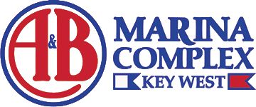 Logo of AB Marina Complex at Key West, featuring a large red and black circle with 'AB' in it and blue text.