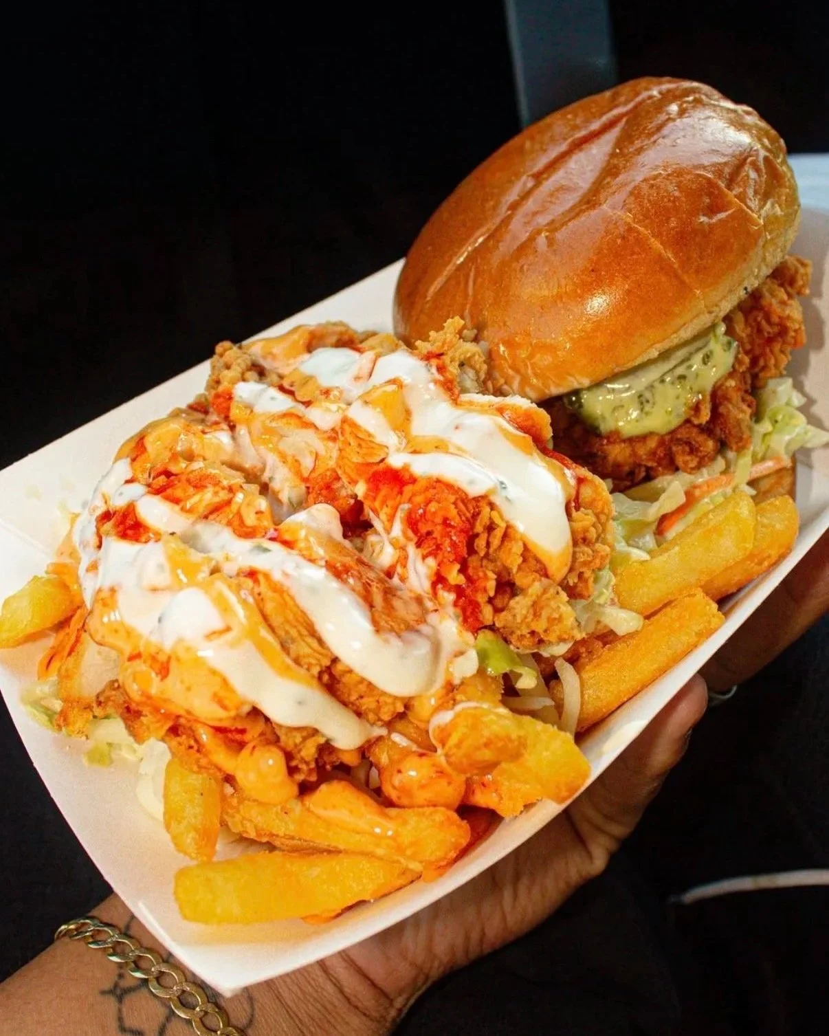 El Reaper hand-breaded spicy chicken sandwich and loaded fries
