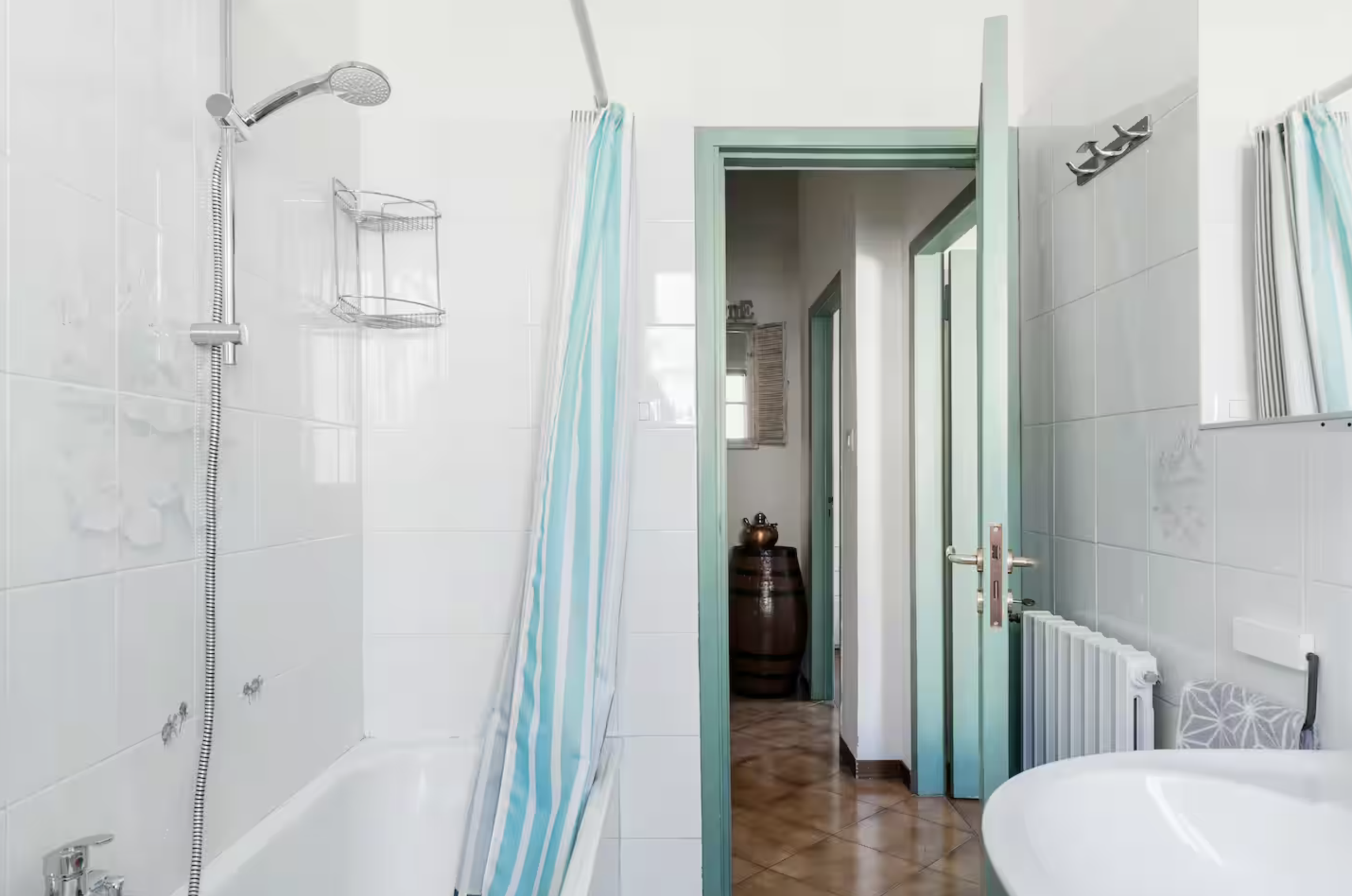 Bathroom with bathtub and shower at Casa Luce Tuscany, a holiday apartment in Poggibonsi near Siena, San Gimignano and Chianti.