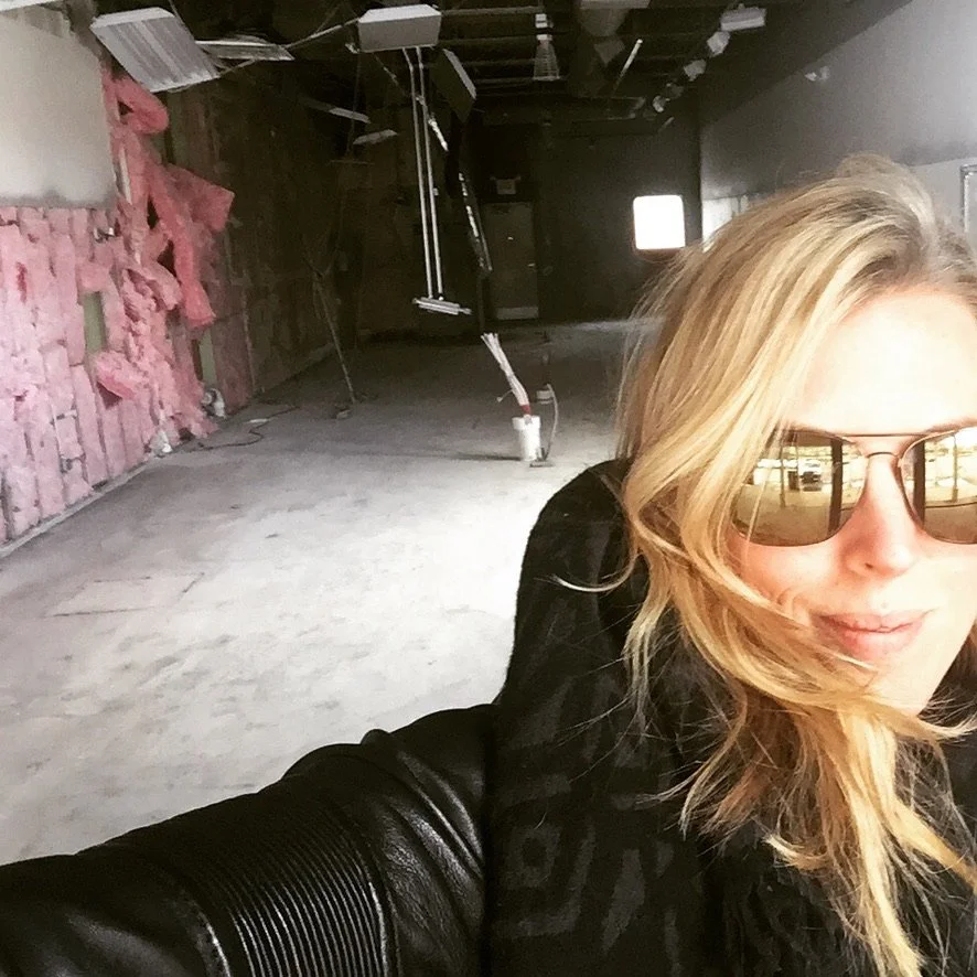 Kristen Cronin in 2015, standing in the gutted space that became her second Club Pilates studio