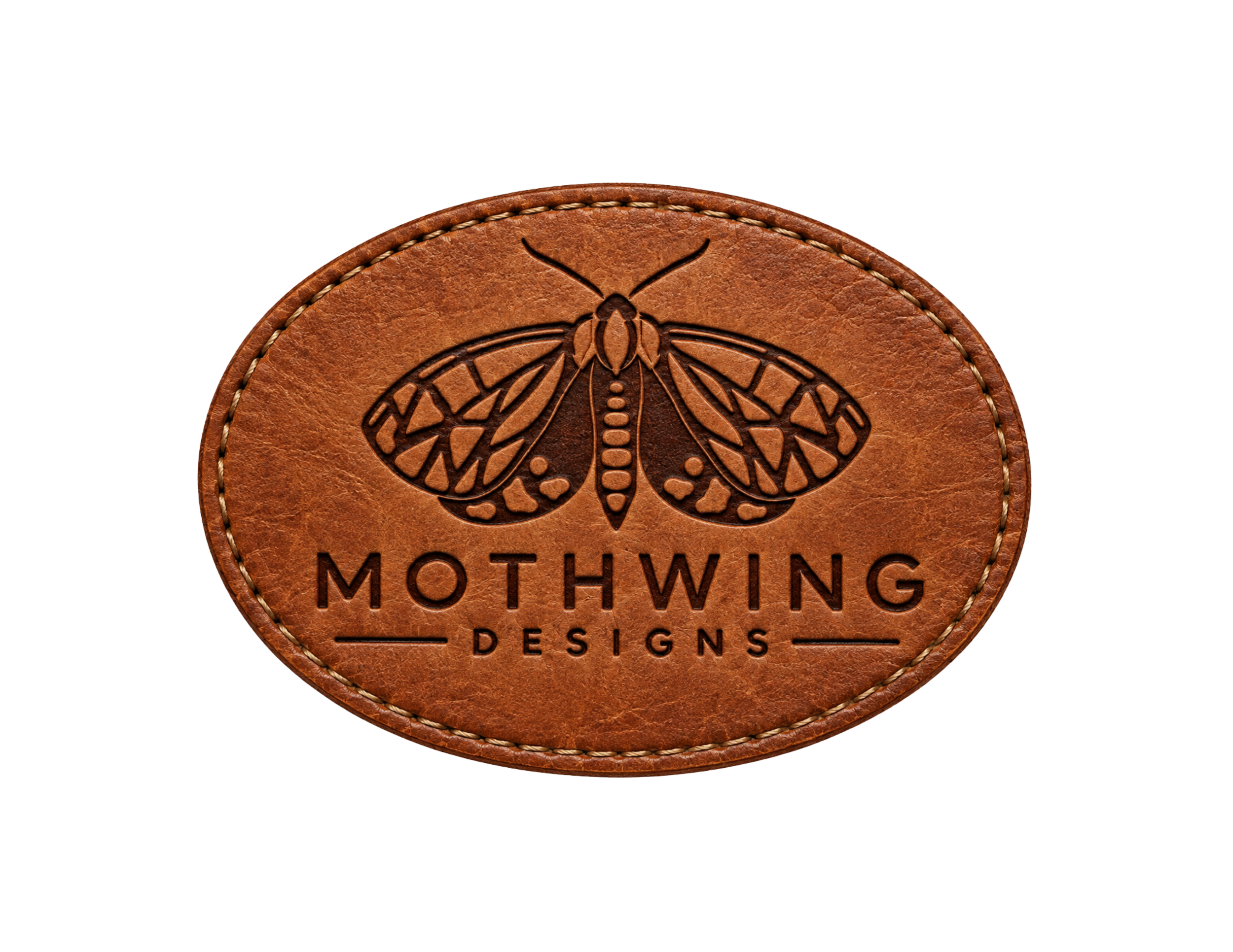 Close-up of a circular leather patch embossed with a moth and the text 'Mothwings Designs'.