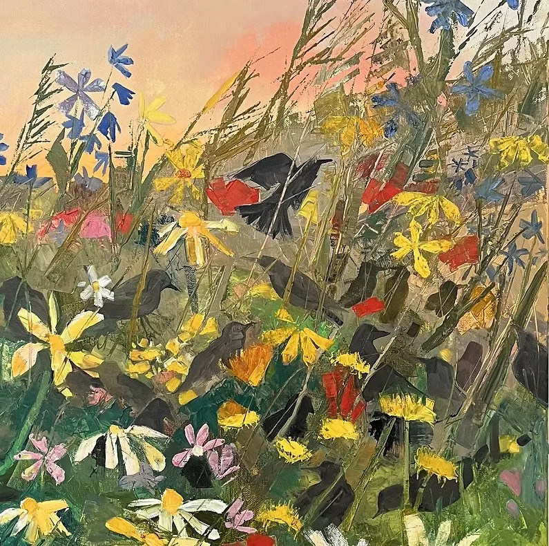 Painting of a vibrant wildflower meadow with blue, yellow, red, pink, and white flowers and dark butterflies, set against a soft pink and beige sky.