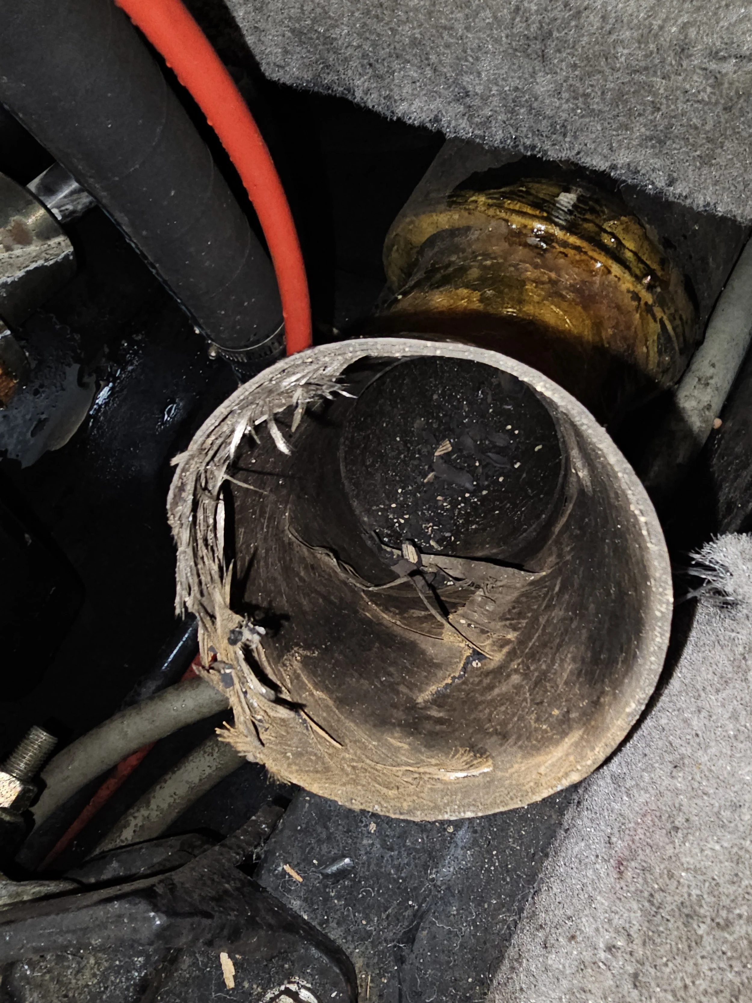 Overheated fiberglass muffler