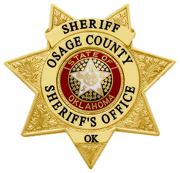 Gold sheriff's badge from Osage County, Oklahoma, with an embossed star and a central emblem reading 'State of Oklahoma'.