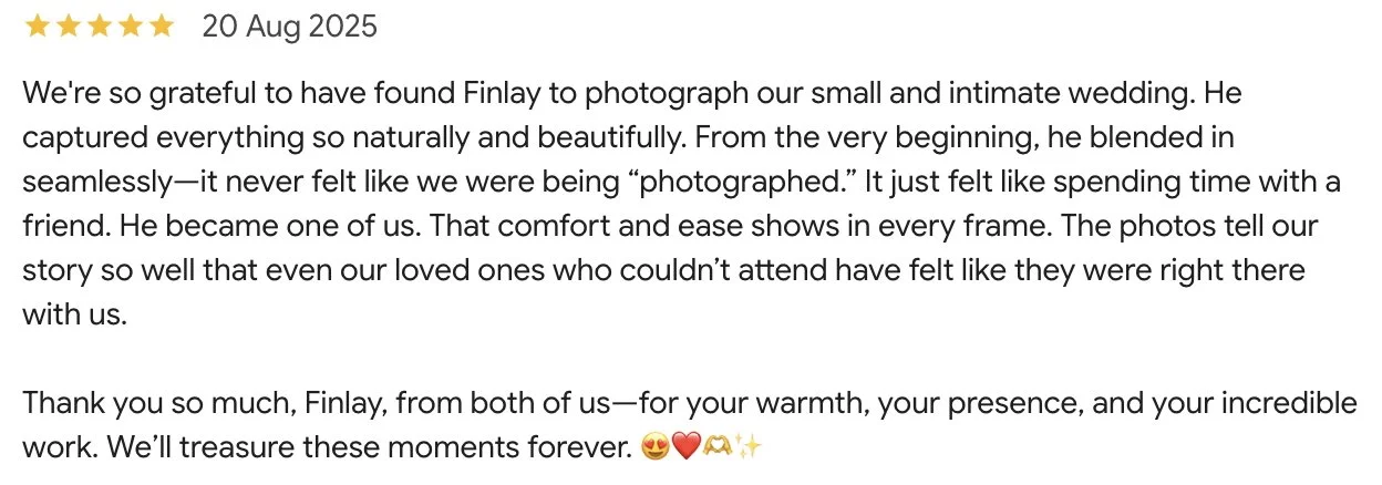 A wedding review with five stars, dated August 20, 2025, expressing gratitude for photographing a small, intimate wedding and highlighting the natural, seamless, and comforting style of the photographs, especially noting Finnay's warm presence.
