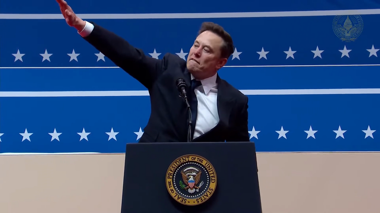 Elon musk giving a fascist strong-arm salute.
