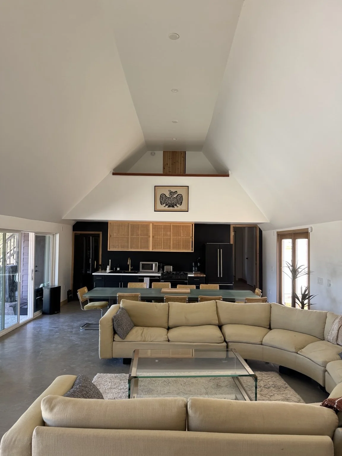 Finished great room renovation with vaulted ceiling, kitchen, dining and living areas