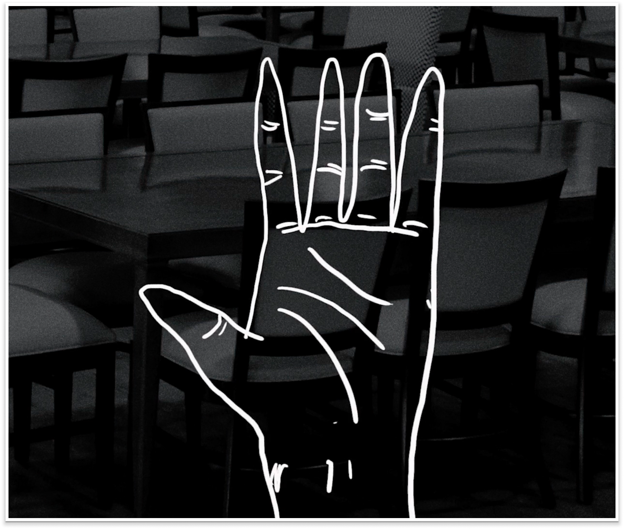 A black wall with a white line drawing of a hand making a peace sign in front of a background of empty chairs.