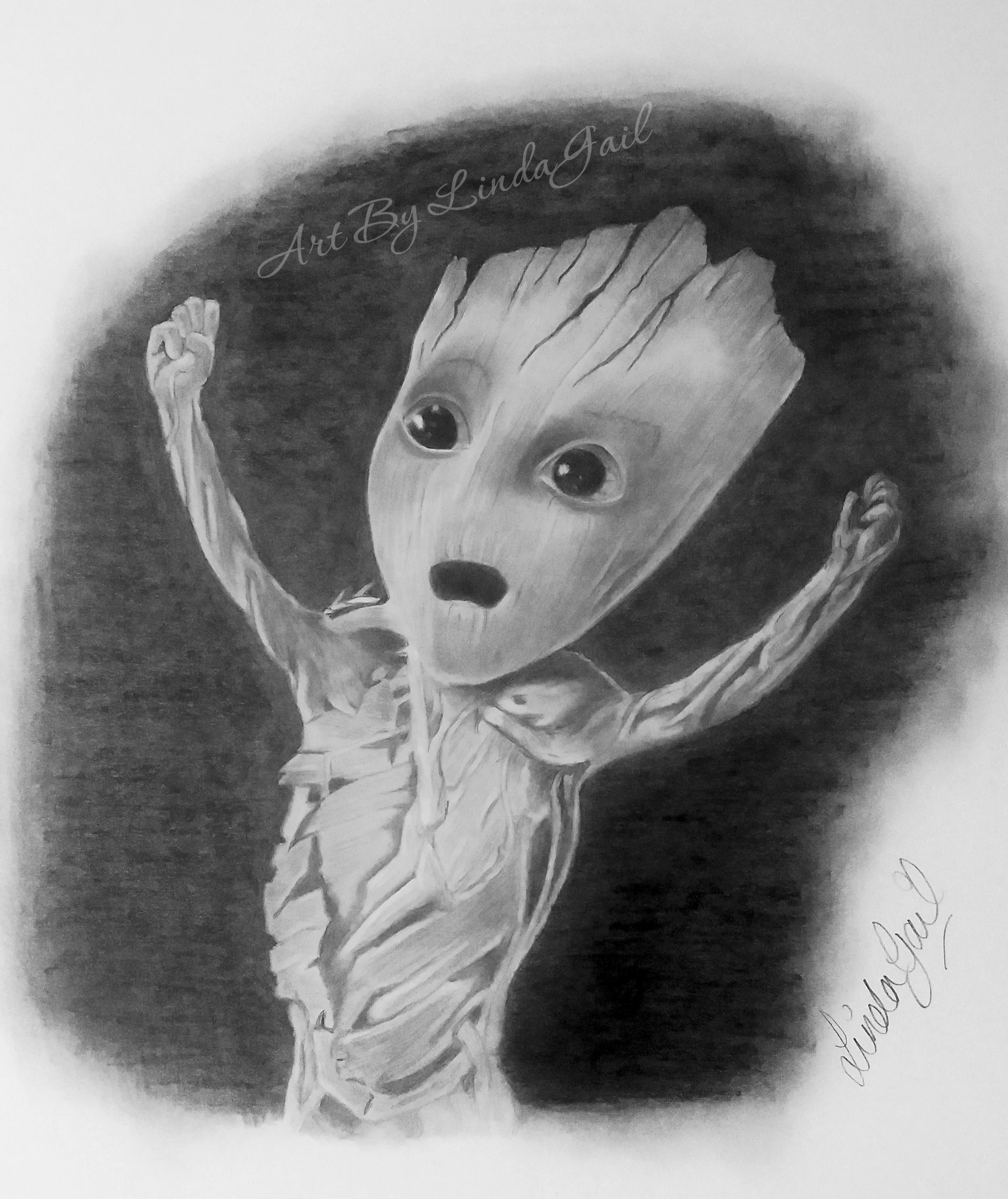 A detailed pencil drawing of a small tree character with big eyes, small nose, and has an arms raised with a clenched fist. The background is primarily dark.  Fan art inspired by Guardians on the Galaxy character Groot.