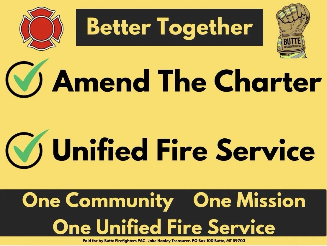 Poster with yellow background highlighting a fire department initiative. Features a fire department emblem at the top left, a firefighter glove with 'Butte Firefighters PAC' on it in the top right, and check marks next to the bold text 'Amend The Charter' and 'Unified Fire Service.' The bottom section, in black, emphasizes the community focus with the phrases 'One Community,' 'One Mission,' and 'One Unified Fire Service,' with a note at the bottom about funding.
