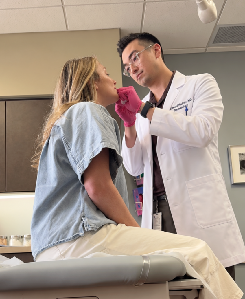 Dr. Edward K. Hadeler performing a cosmetic injectable treatment during a dermatology visit.