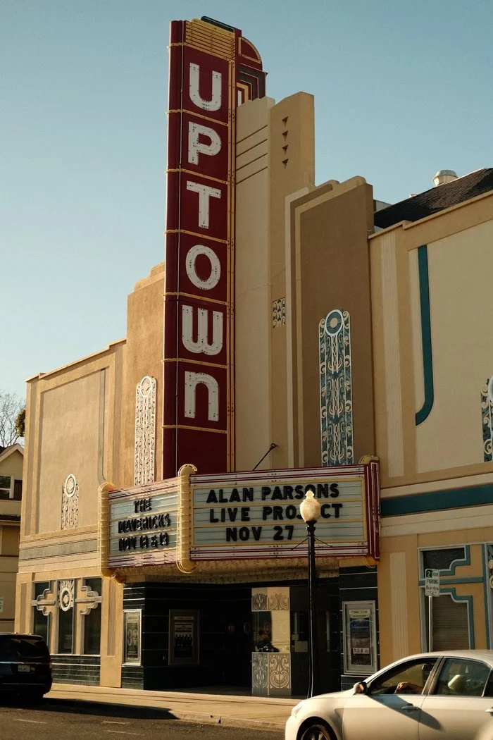 The Uptown Theater marquee with an upcoming live concert event on November 27.