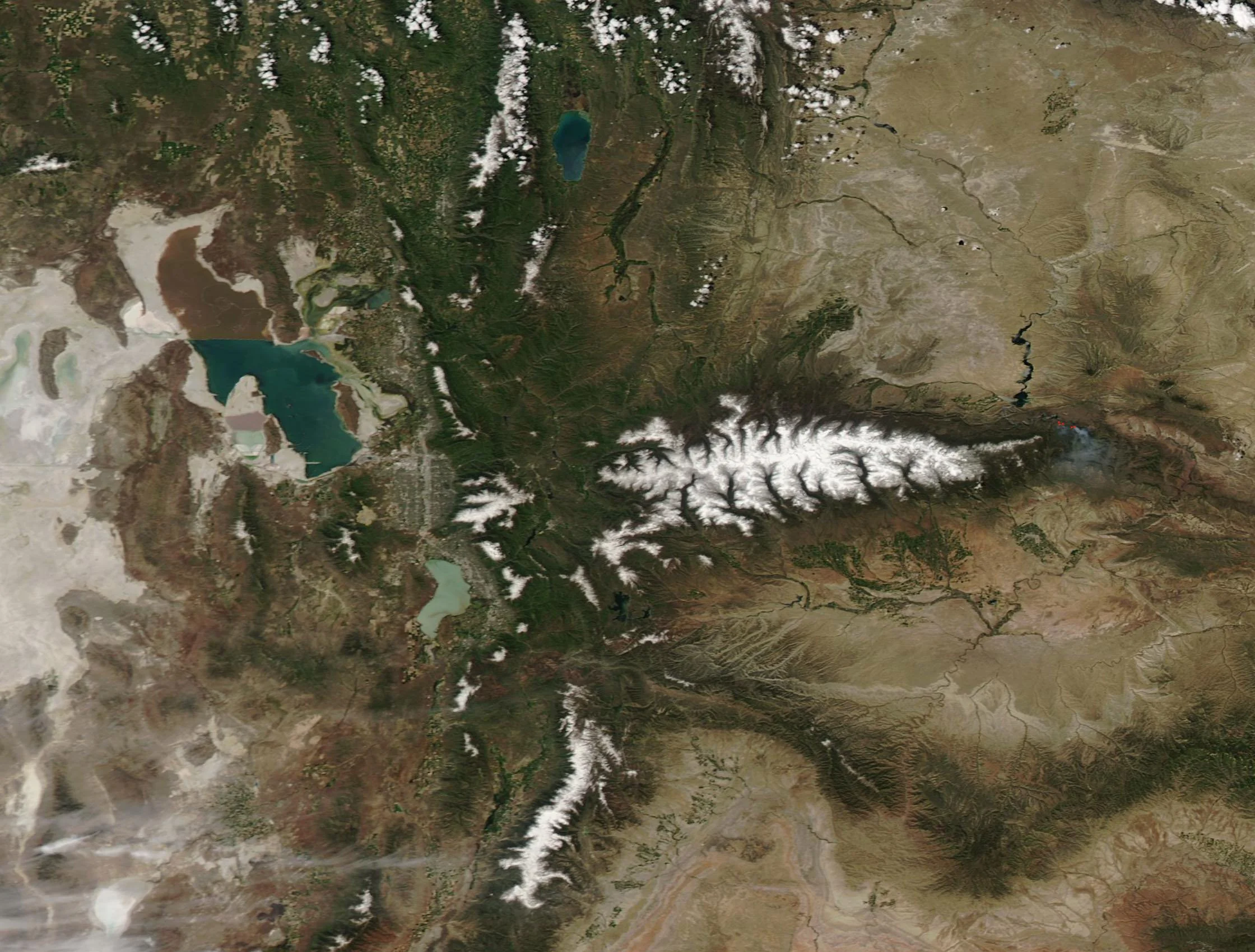 NASA’s Aqua satellite flew over Utah on June 6, 2019, allowing the Moderate Resolution Imaging Spectroradiometer on board to acquire a colorful true-color image of sand, snow, salt and forest.