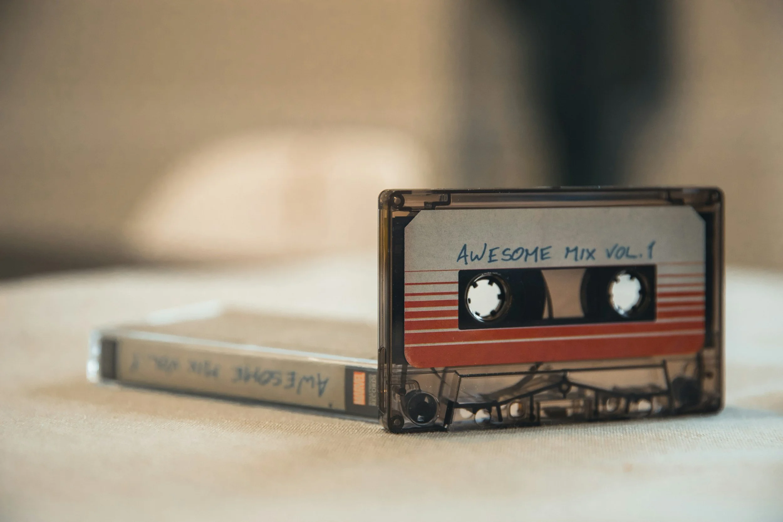 Vintage mixtape cassette labeled “Awesome Mix Vol. 1,” representing Gen X nostalgia