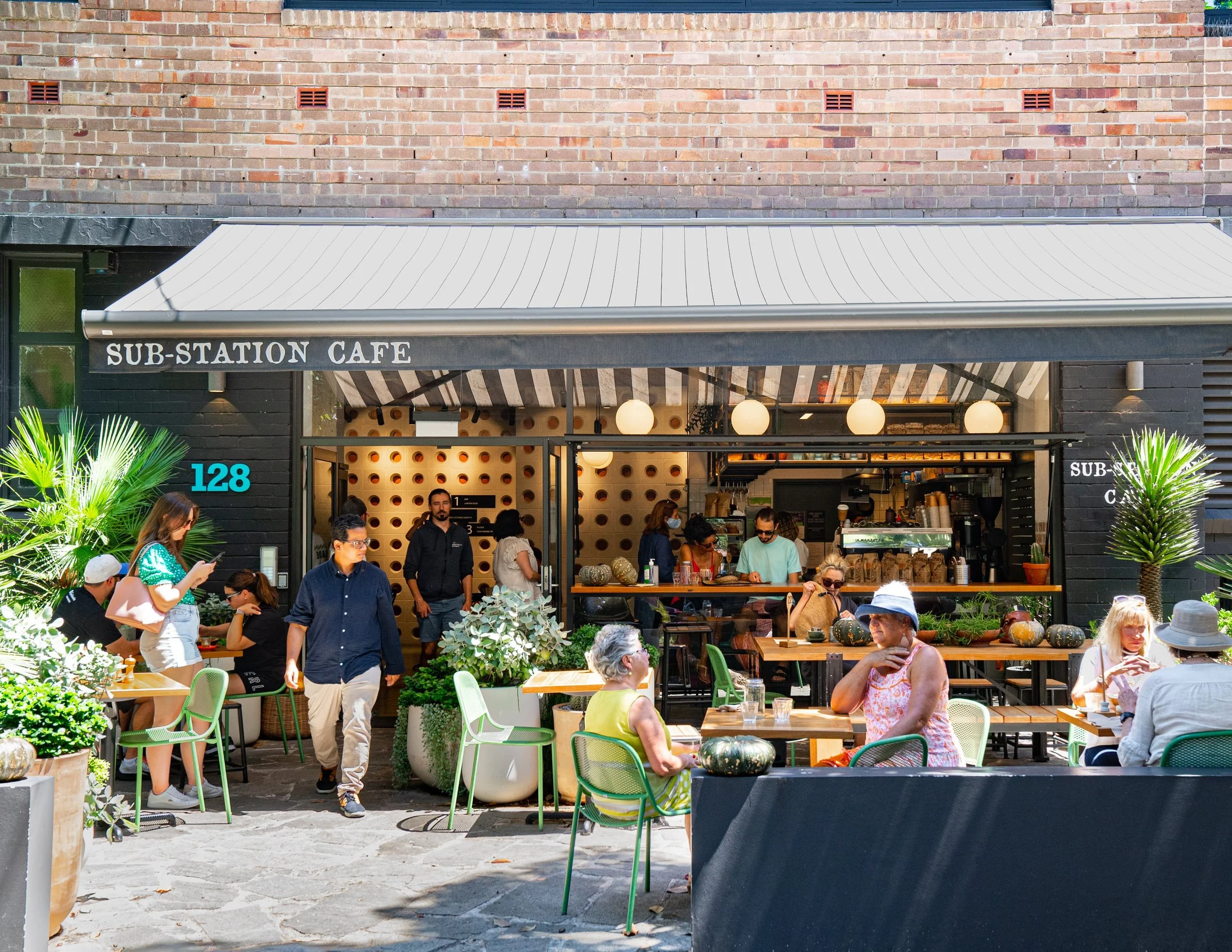 Lively coffee shop in Sydney with outside seating area