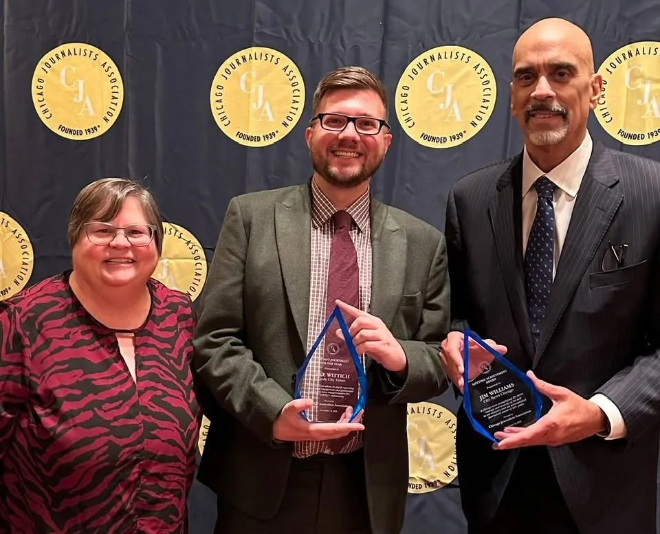 Tracy Baim, Jakes Wittich and Jim Williams standing together at a Chicago Journalism Awards event, with the Chicago Journalists Association logo on a black backdrop behind them.