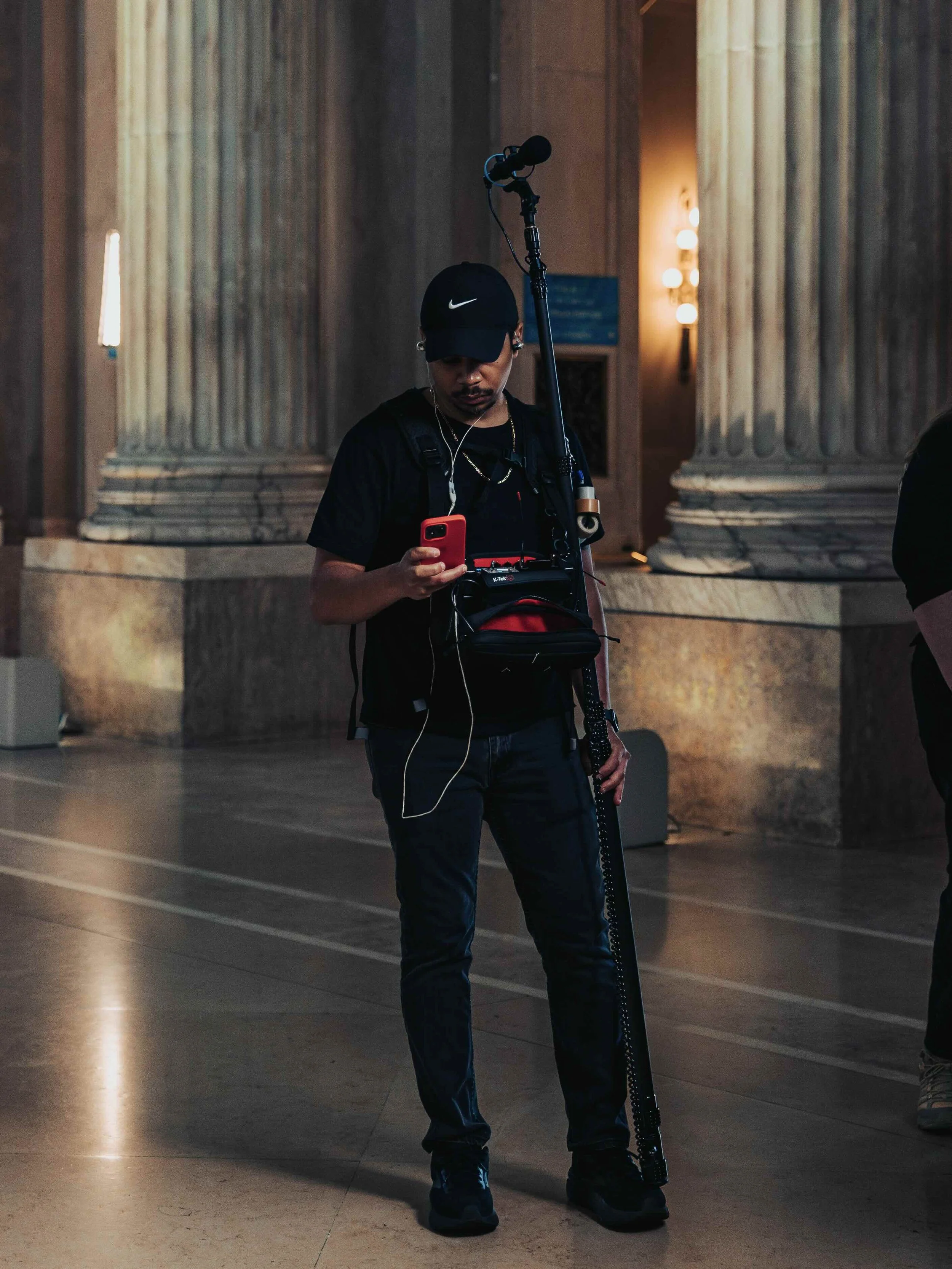Philadelphia sound mixer Juan Ortiz on set inputting metadata for his client's sound report.