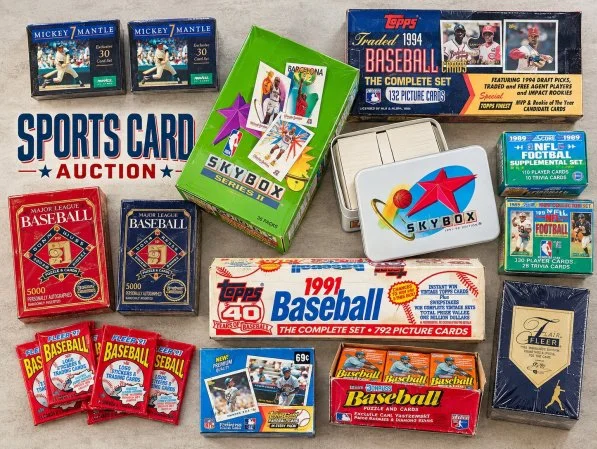 Vintage sealed sports and trading card boxes from the 1980s and 1990s.