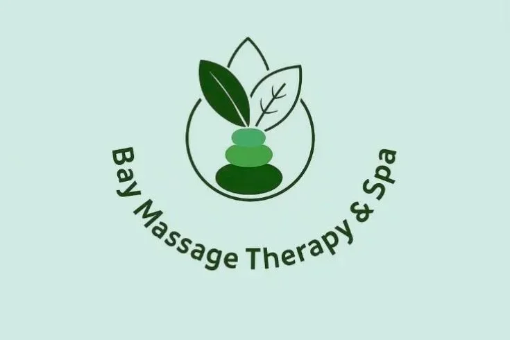 Logo for Bay Massage Therapy & Spa with green leaves and stones icon inside a water droplet outline