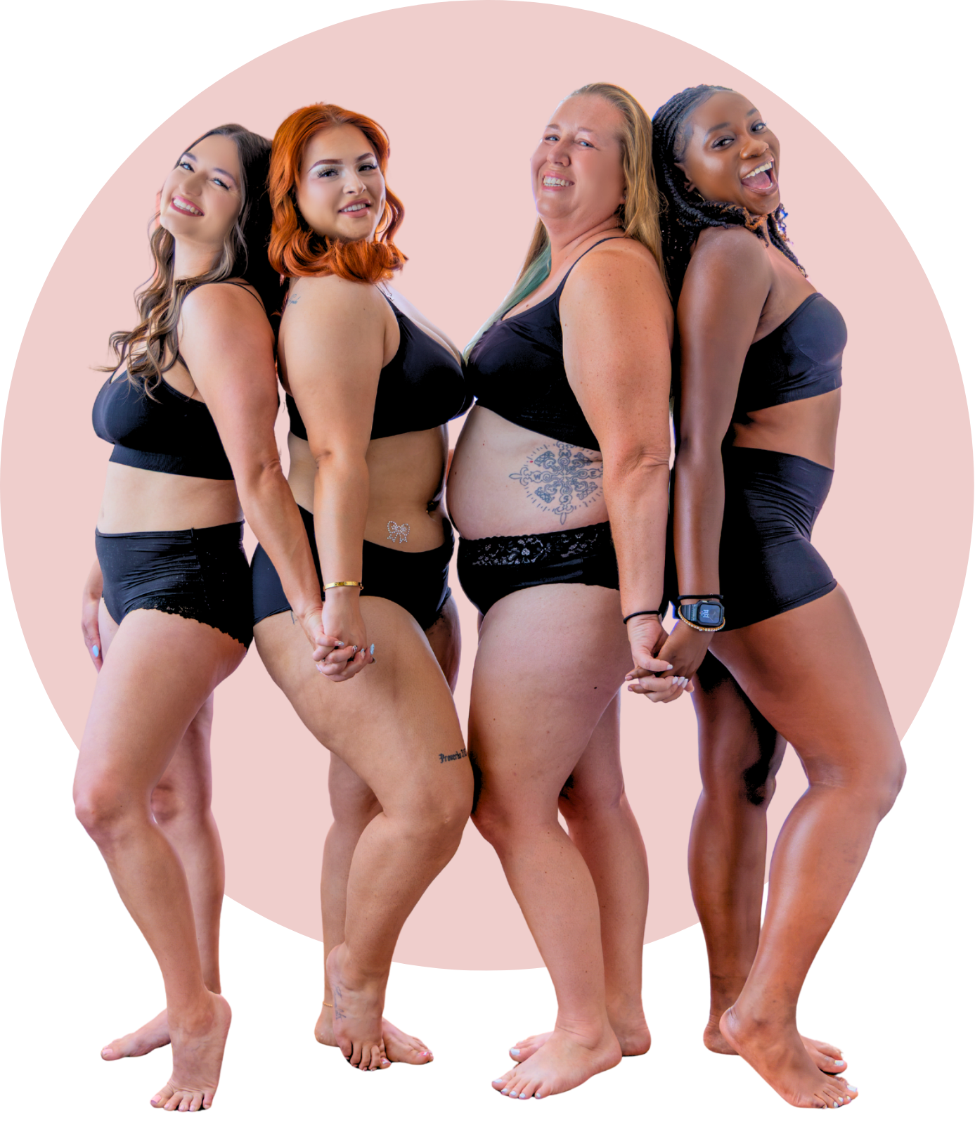 Four women wearing matching black lingerie holding hands and standing back-to-back against a pink background, smiling and looking happy.