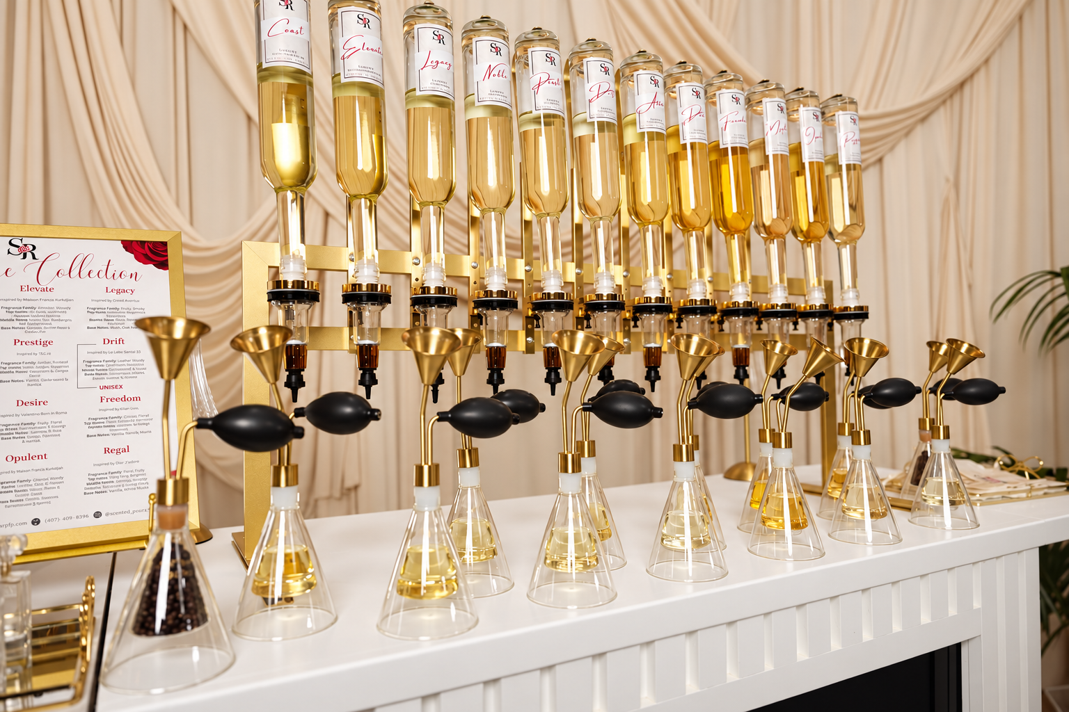 Luxury fragrance sampling display with golden perfume bottles, scent diffusers, and labeled fragrance collection menu
