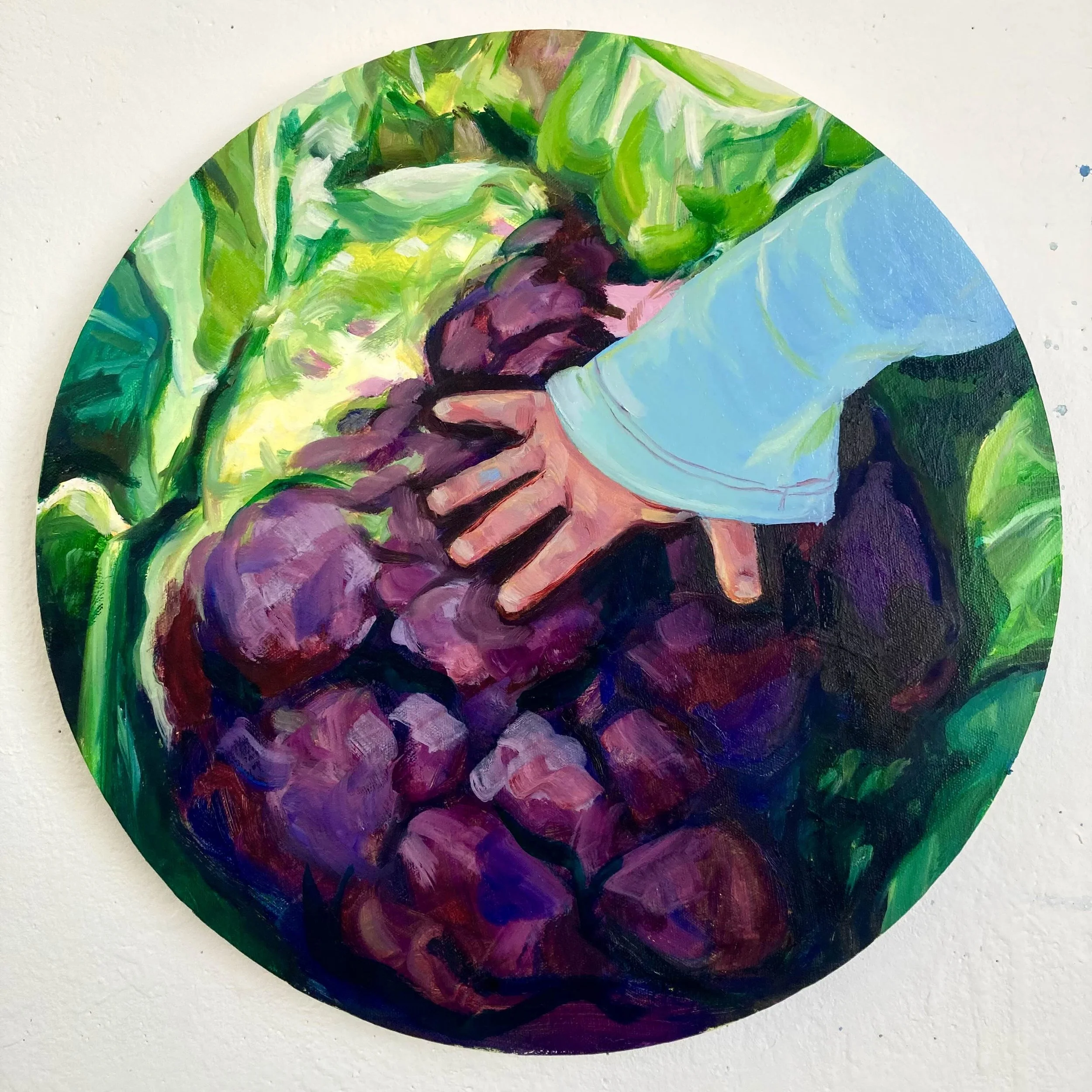 Colourful abstract painting of a child hand in a blue shirt surrounded by vibrant green foliage and purple cauliflowers.
