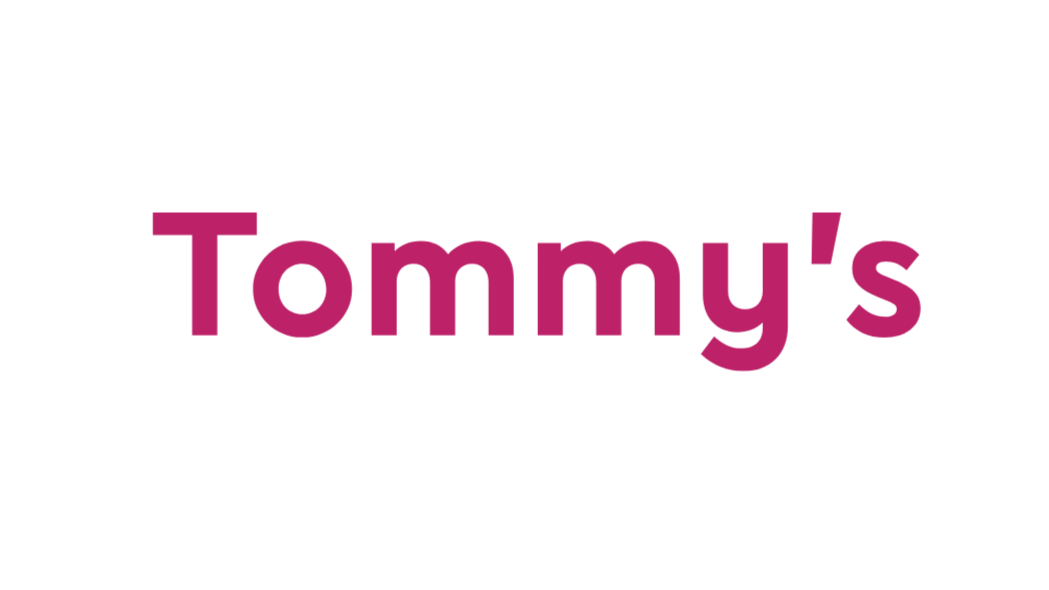 Logo with the text "TOMMY'S" in large pink letters and small black text underneath that says "BAR & GRILL."