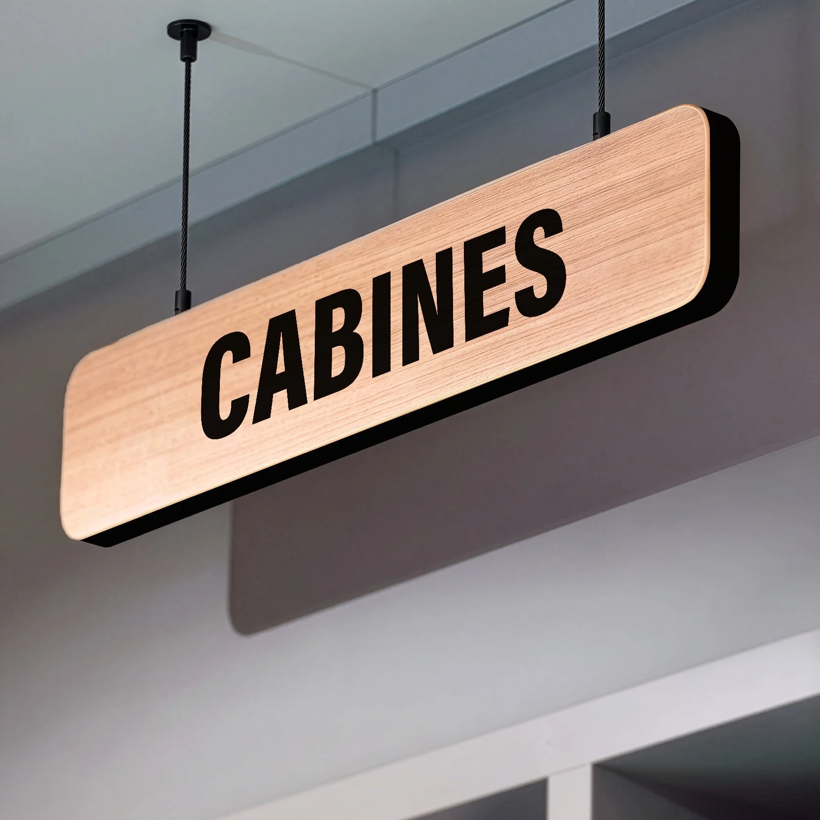 Panneau suspendu en bois « Cabines », signalétique pérenne Monoprix pour le rayon mode