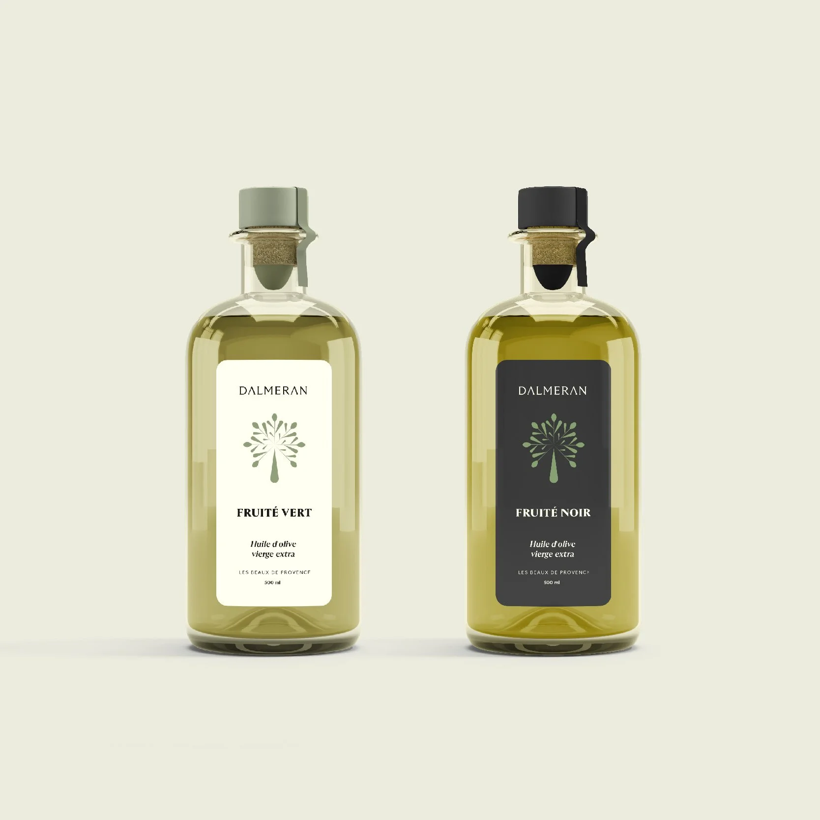 Bouteilles d'huile d'olive vierge extra Dalmeran « Fruité vert » et « Fruité noir », étiquettes crème et noire avec illustration d'olivier