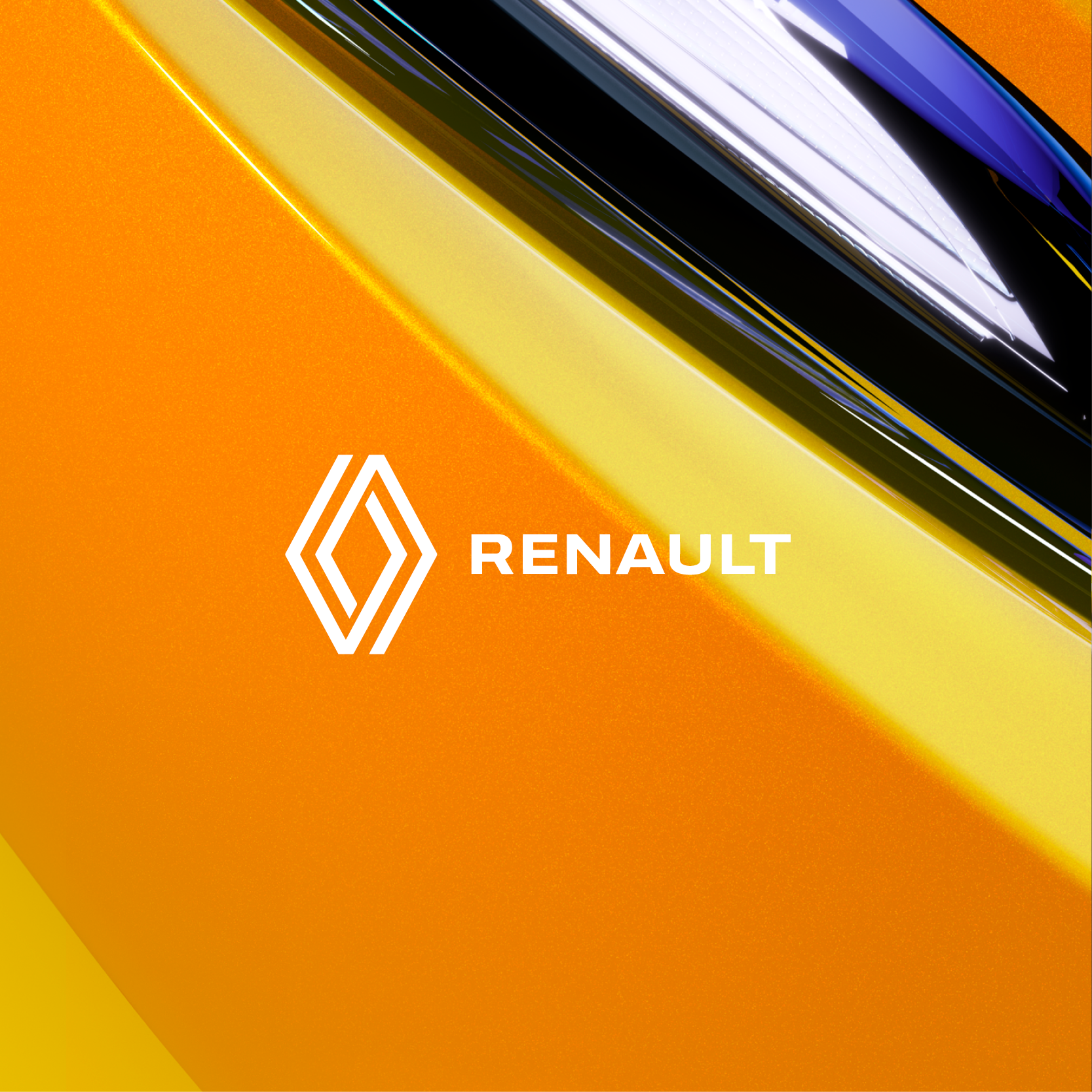 Direction artistique image Renault : zoom sur le losange de la marque, carrosserie orange et jaune