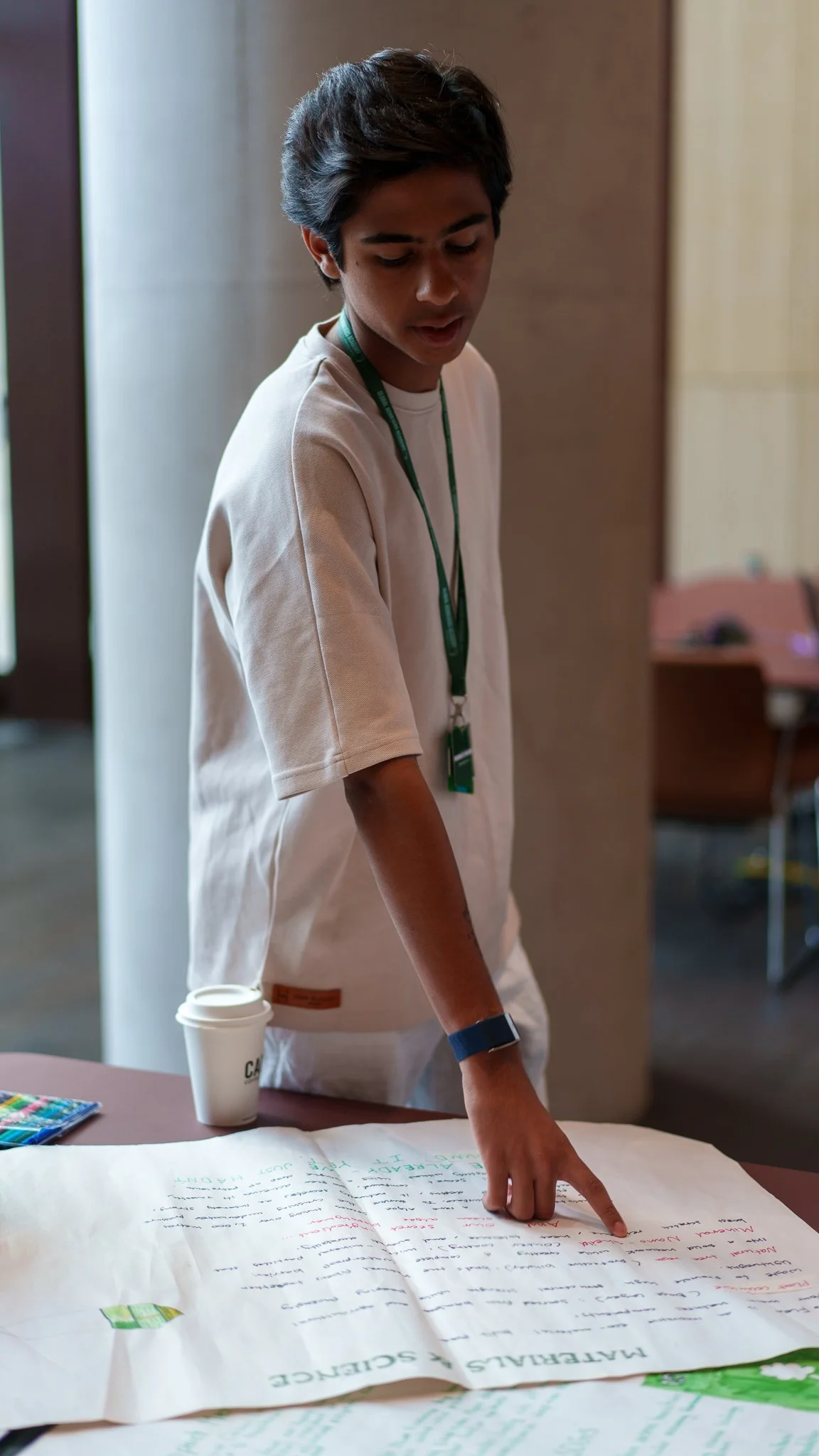 Corporate event photography showing a participant during a business workshop