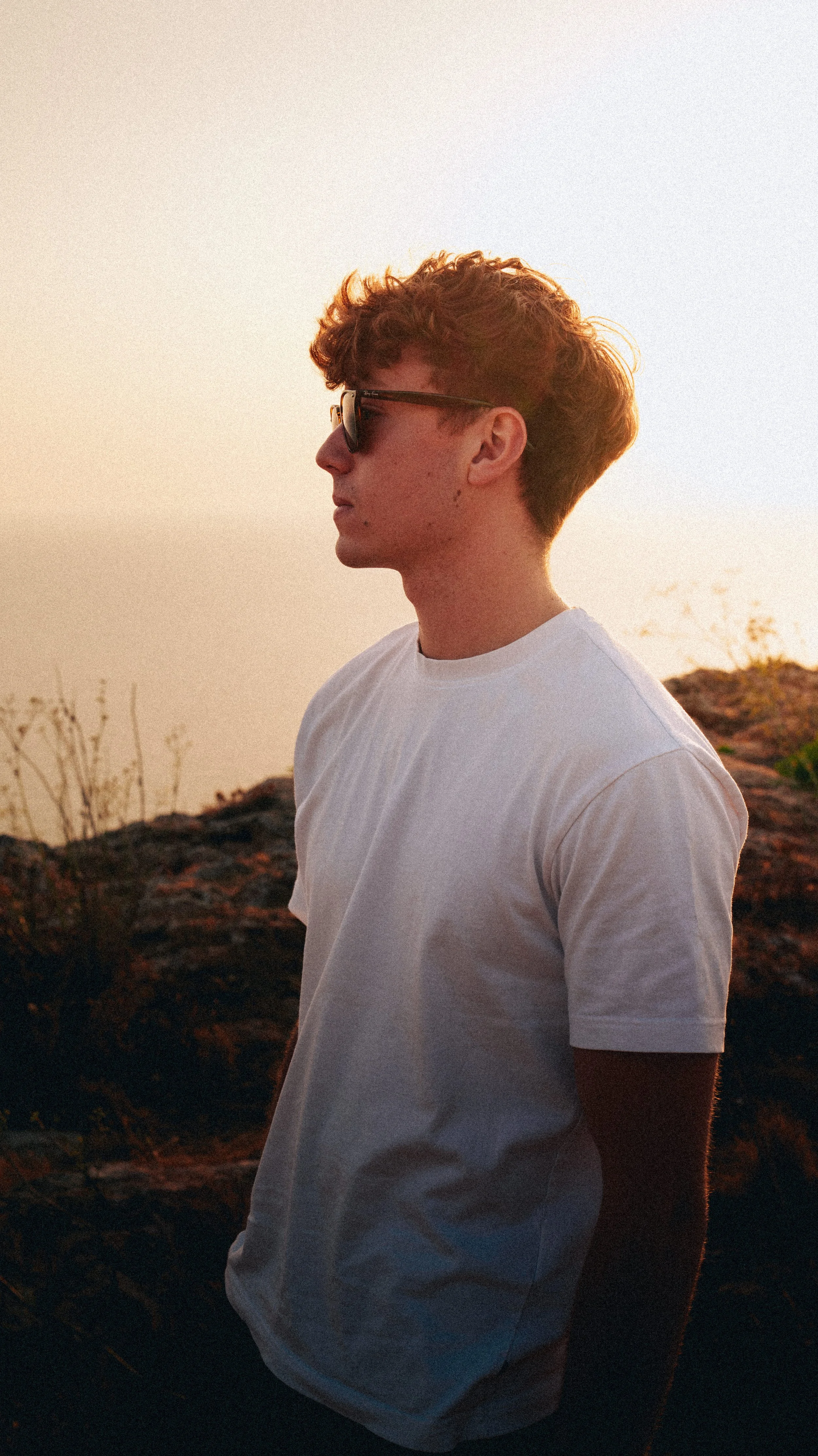 Man wearing sunglasses outdoors during a lifestyle brand photoshoot in Malta