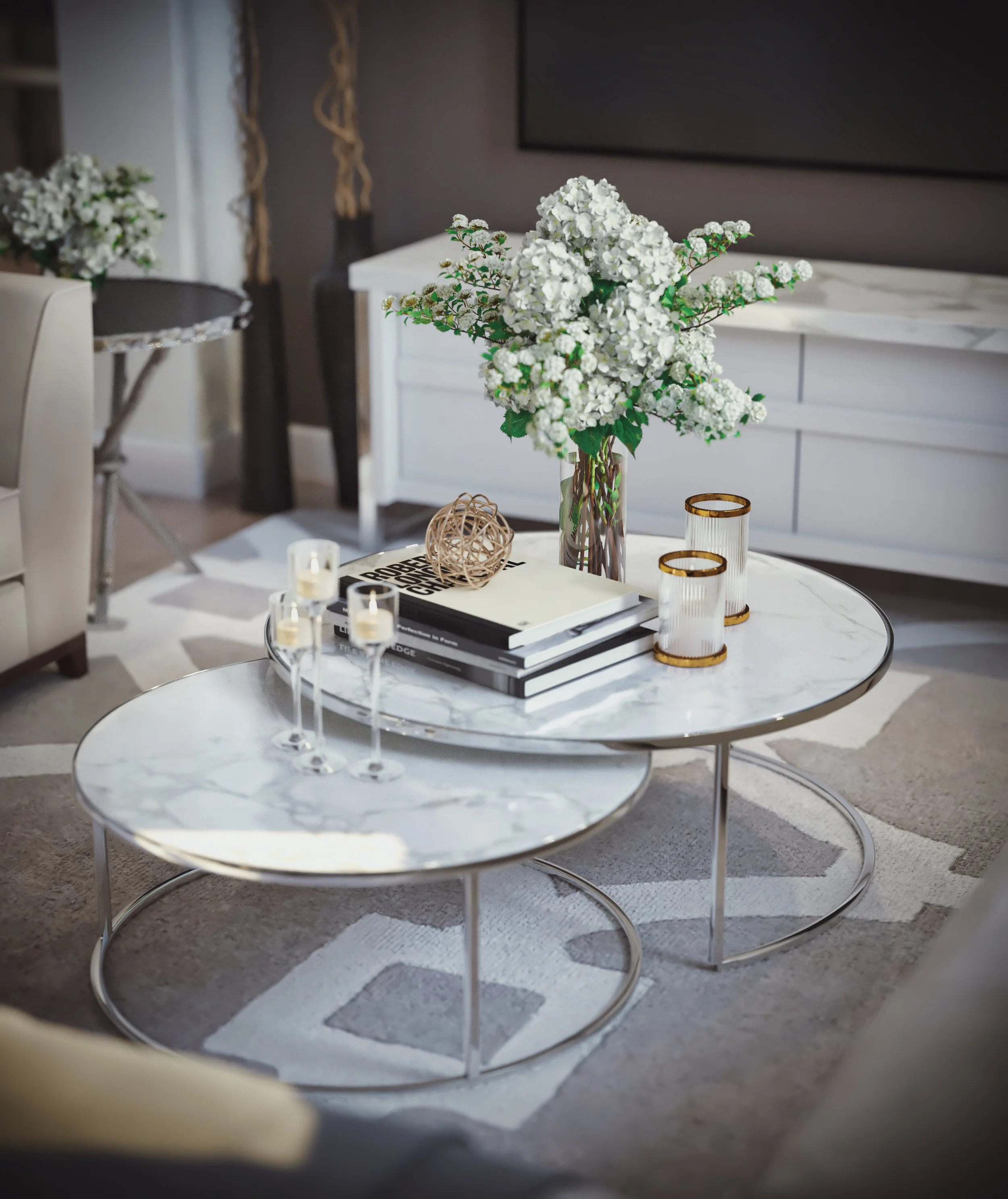 White flower arrangement on a table in a modern living room.