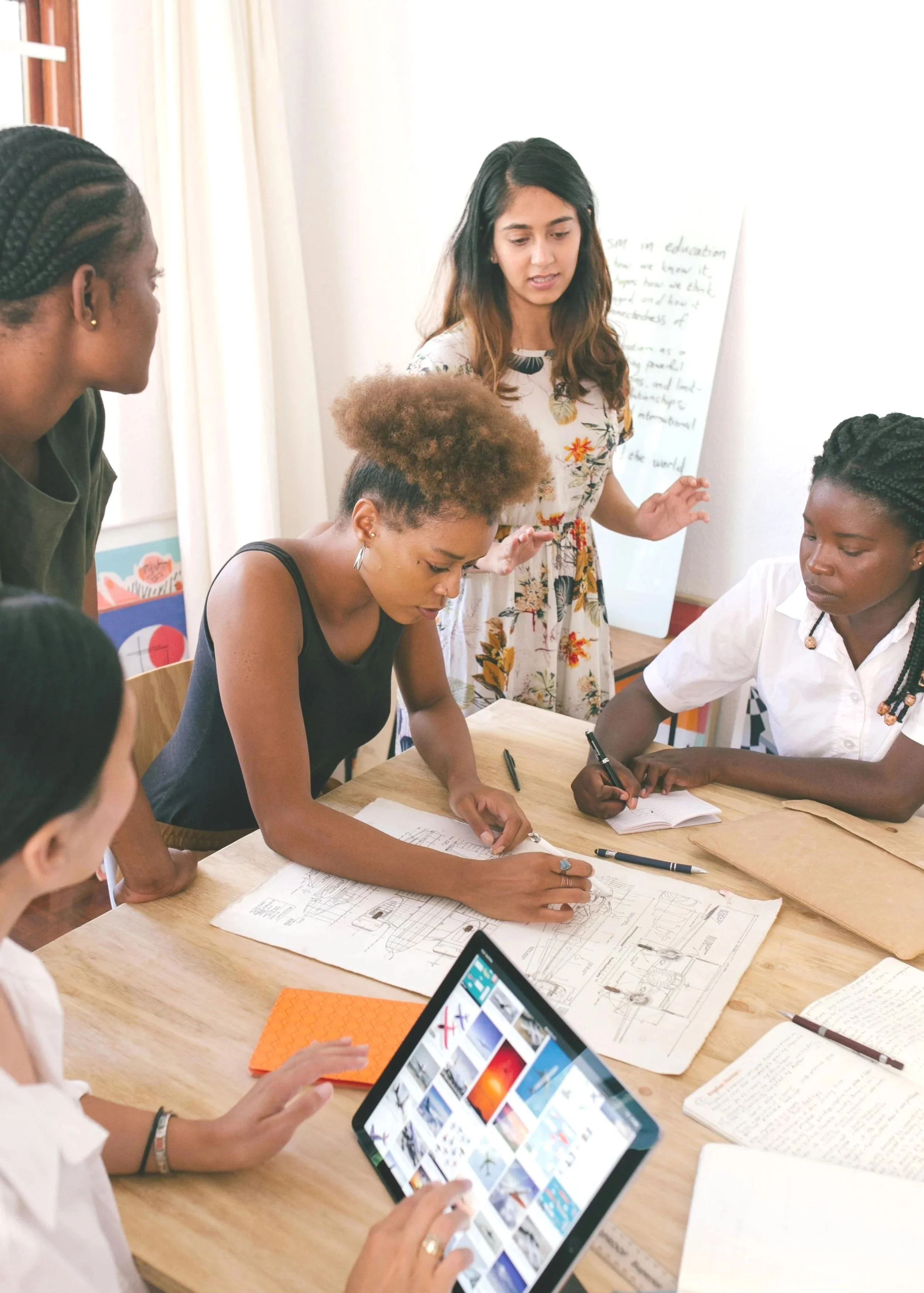 Women collaborating and connecting at a Portland networking event