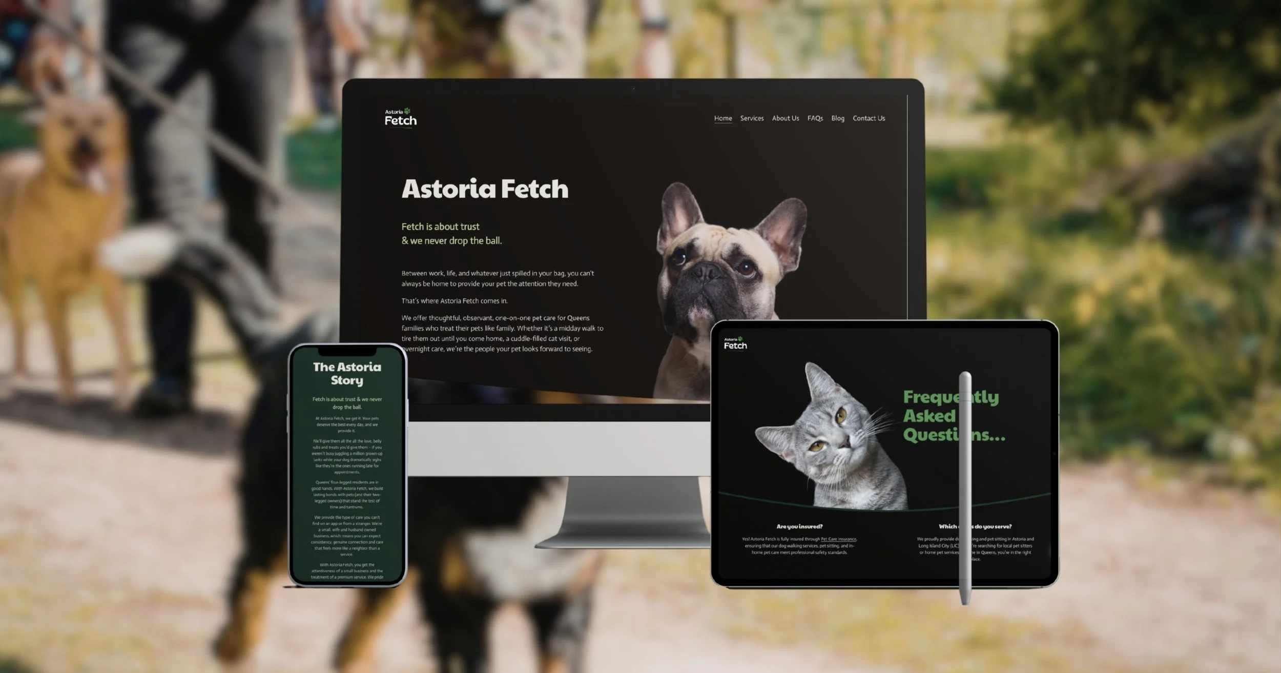 Multiple electronic devices displaying a pet care website titled Astoria Fetch, with images of a dog and a cat, in front of a blurred outdoor background featuring dogs and a person.