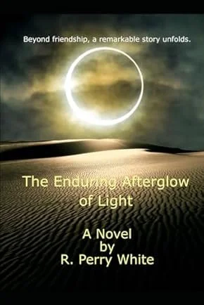 Book cover titled "The Enduring Afterglow of Light" by R. Perry White, featuring a desert landscape with sand dunes and a solar eclipse in the sky, under a tagline about a remarkable story beyond friendship.