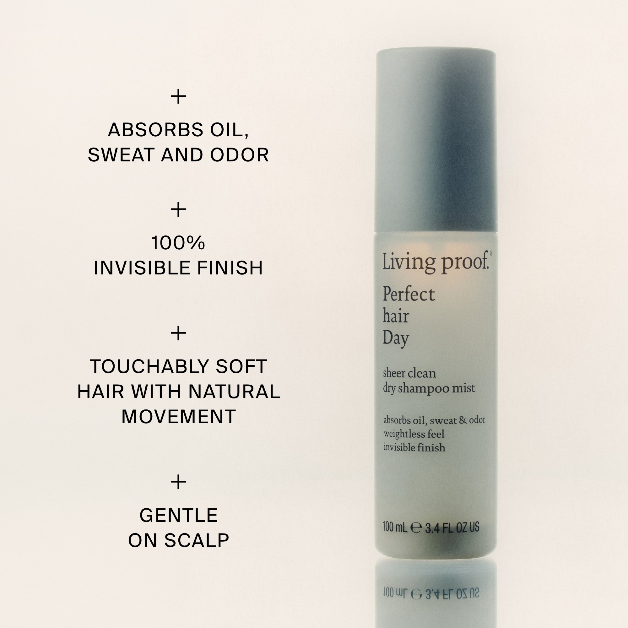 A bottle of Living proof dry shampoo mist with a beige background, showing product details and benefits.
