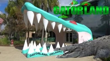 Gatorland entrance featuring its signature open-alligator-mouth arch.