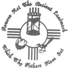 The image is a circular emblem with a crucifix in the center. A hand is holding a sword or dagger on the right side. The text around the emblem reads, 'Until the Last Cancer Landlord, Until the Fathers' Land Be Last.'