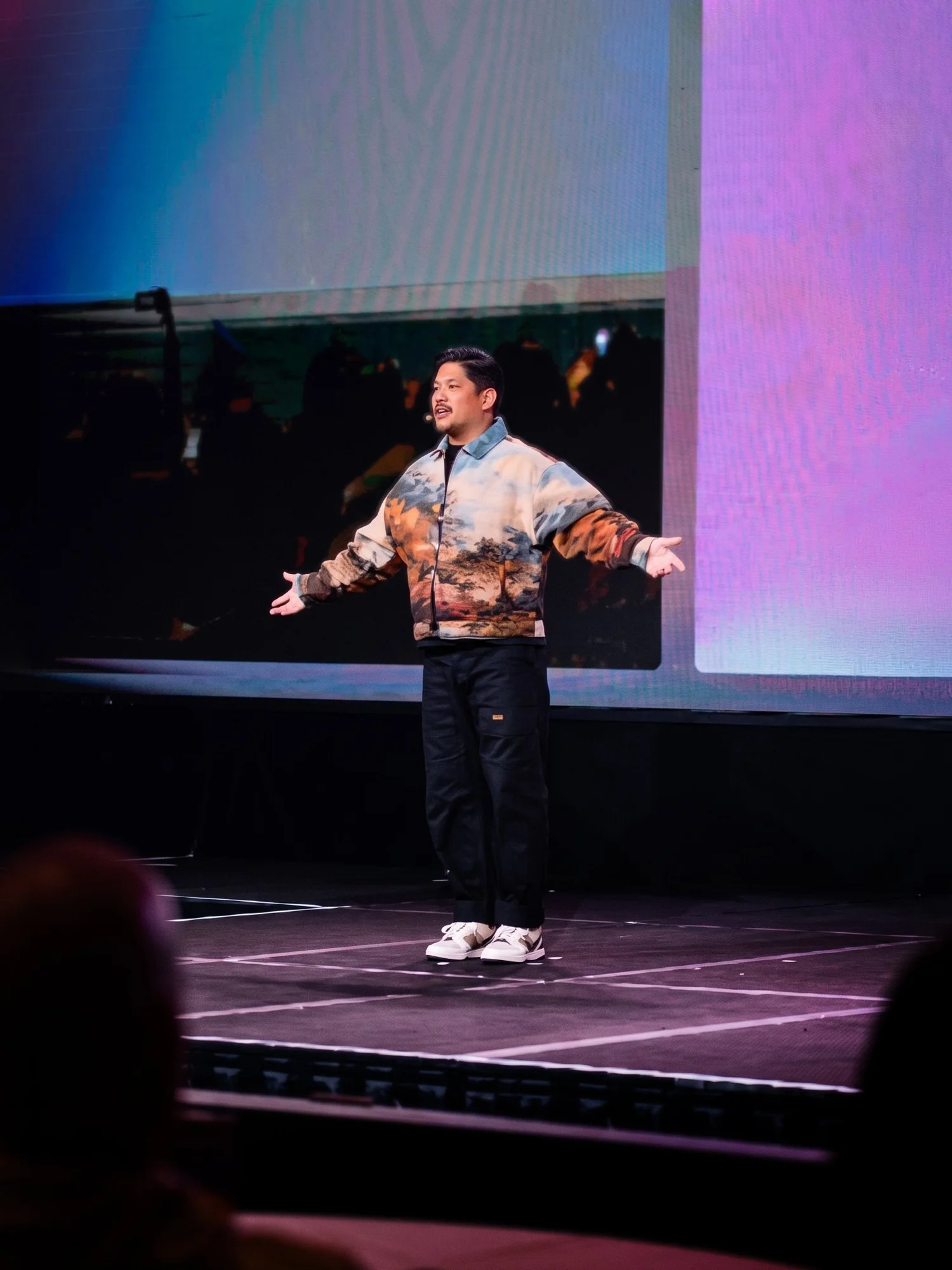 Paul Ringon speaking on stage