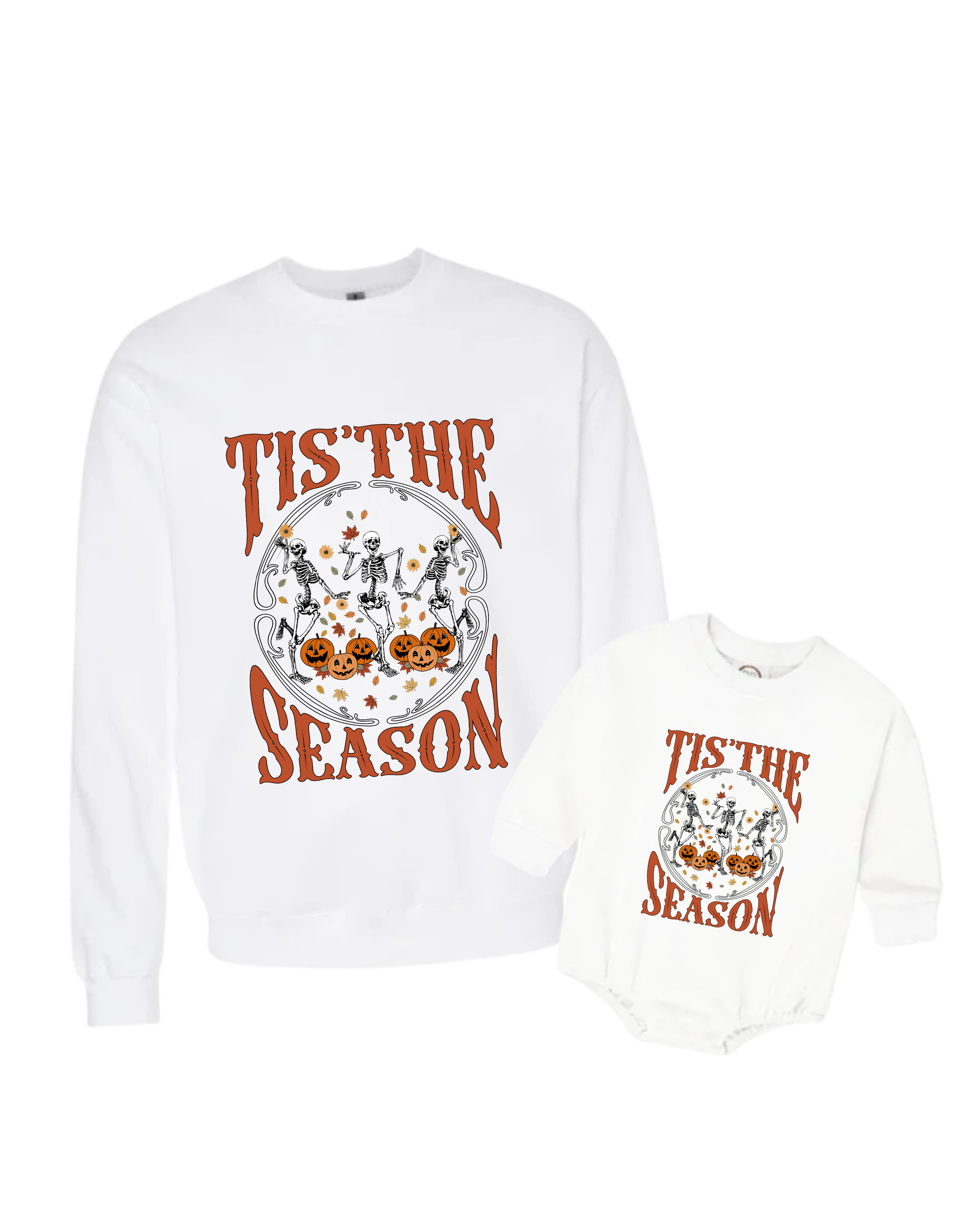 White sweatshirt with a Halloween-themed design featuring skeletons, pumpkins, and autumn leaves, with the phrase "Tis the Season" in orange text.