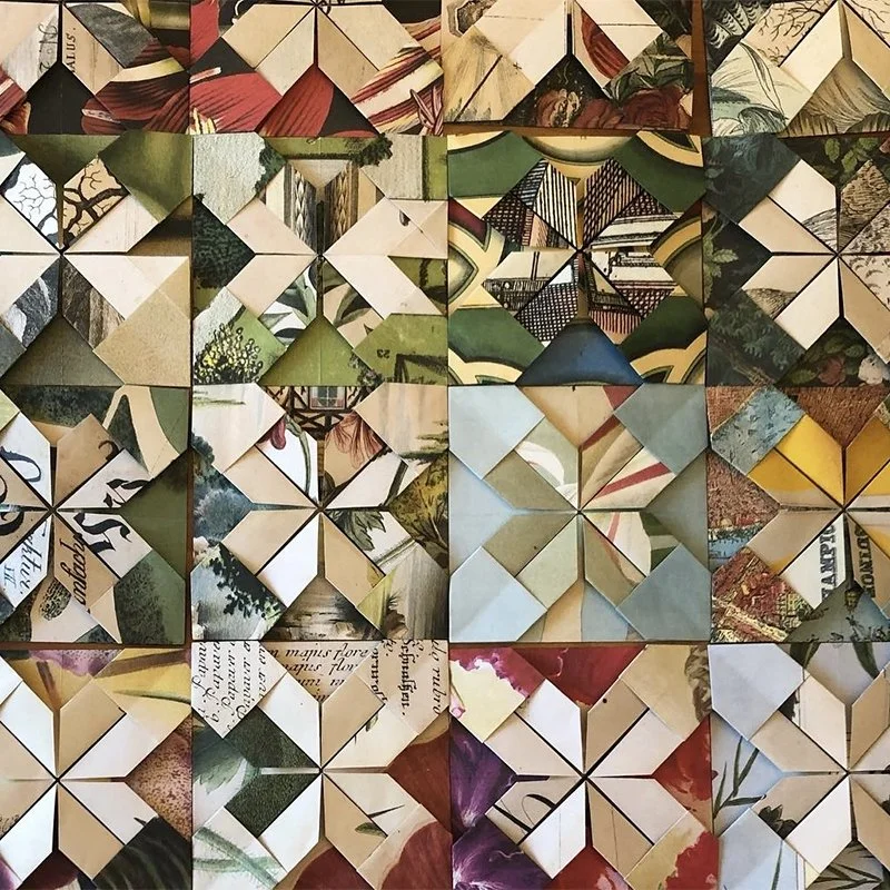 A collage of small squares and triangles made of various patterned and solid-colored paper pieces arranged in a mosaic style.