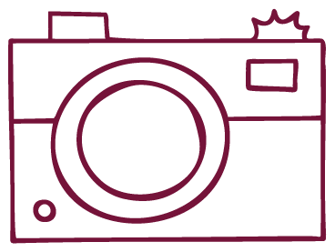Stylized front-loading washing machine icon with a circular door, control panel, handle, and soap bubbles
