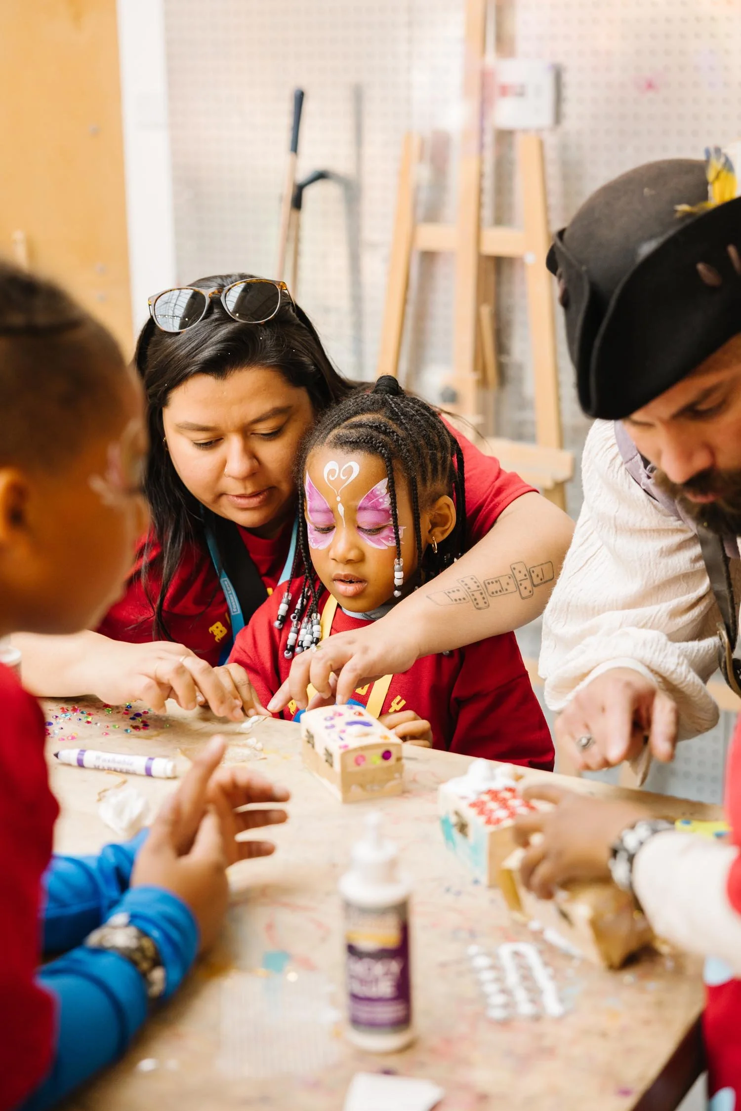 Children at an art station at a nonprofit library event