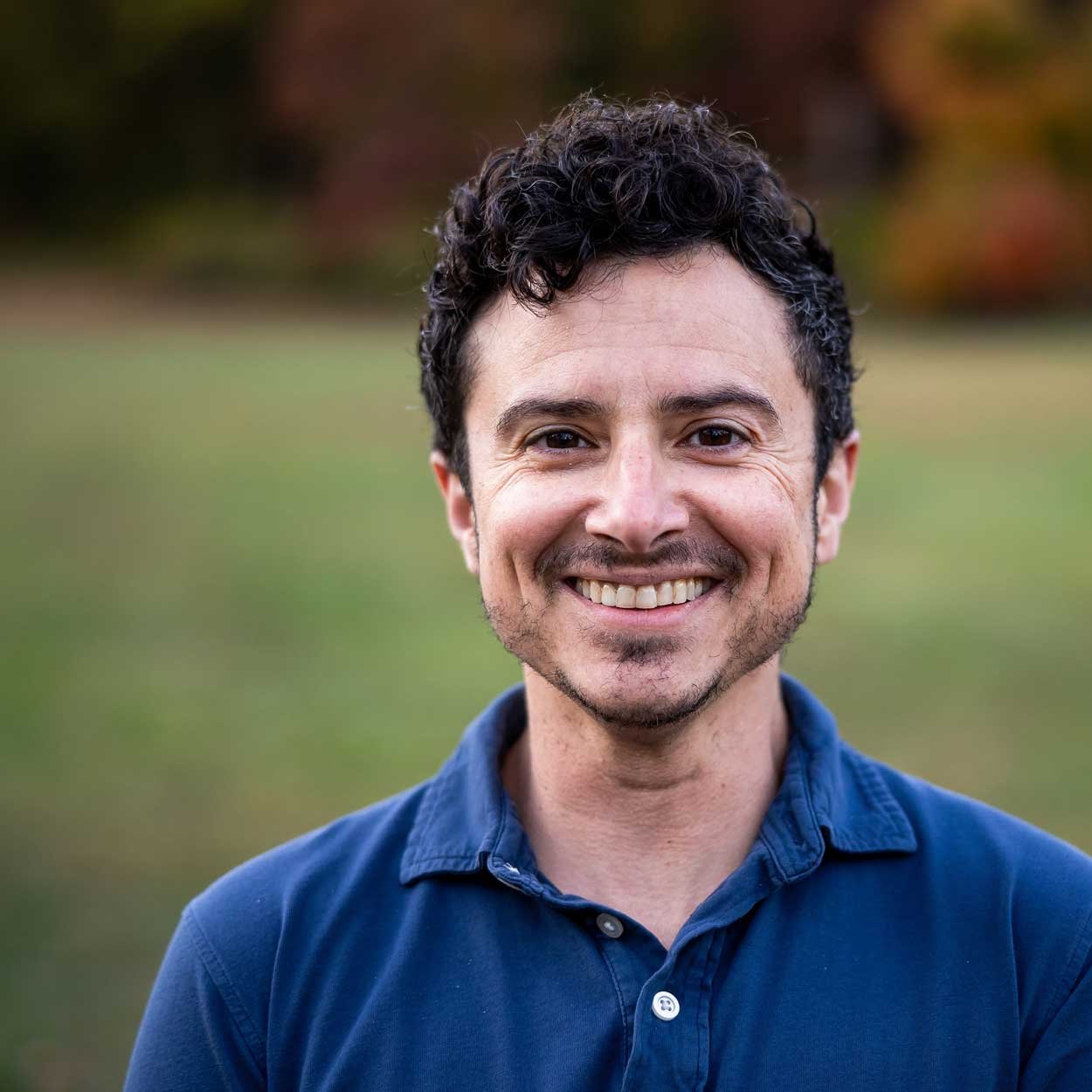Portrait of Alexander Stefanini, out trans man and counselor with 25 years of experience in family dynamics, gender exploration, and LGBTQ issues