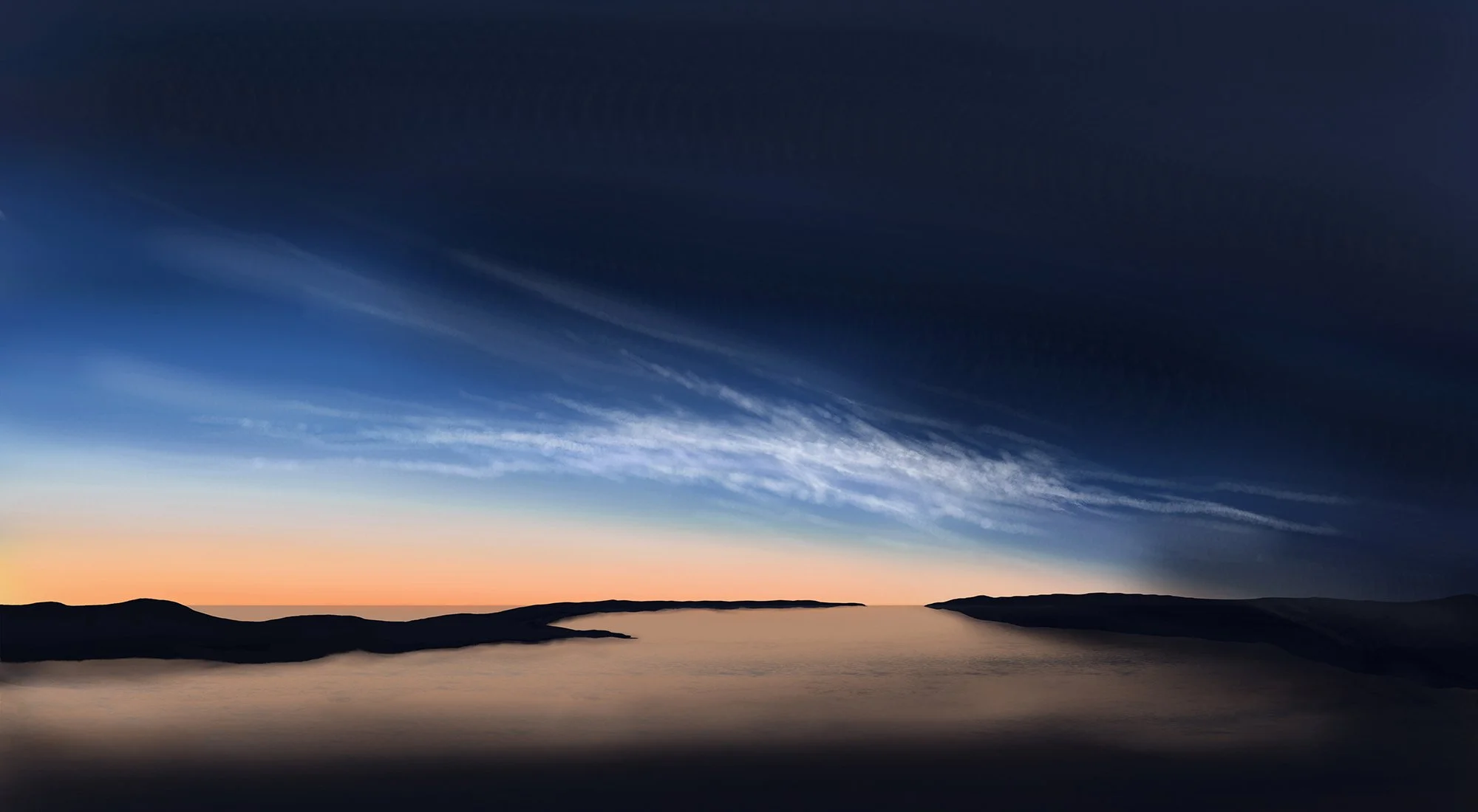 Sunset over a body of water with landmasses in the distance, sky displaying a gradient of colors from warm orange to deep blue with wispy clouds.