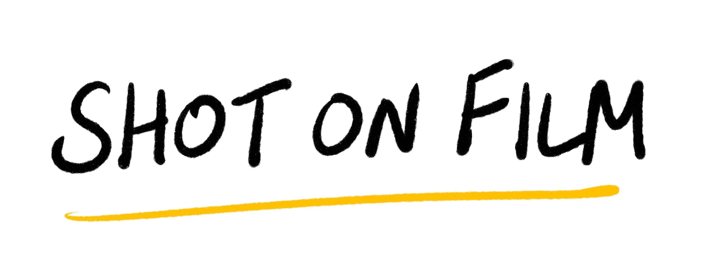 Handwritten text that says 'SHOT ON FILM' with a yellow line underneath.