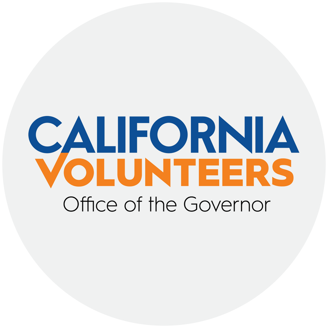 Logo for California Volunteers, Office of the Governor, featuring the words 'California Volunteers' in blue and orange, with a black and gray corner design.