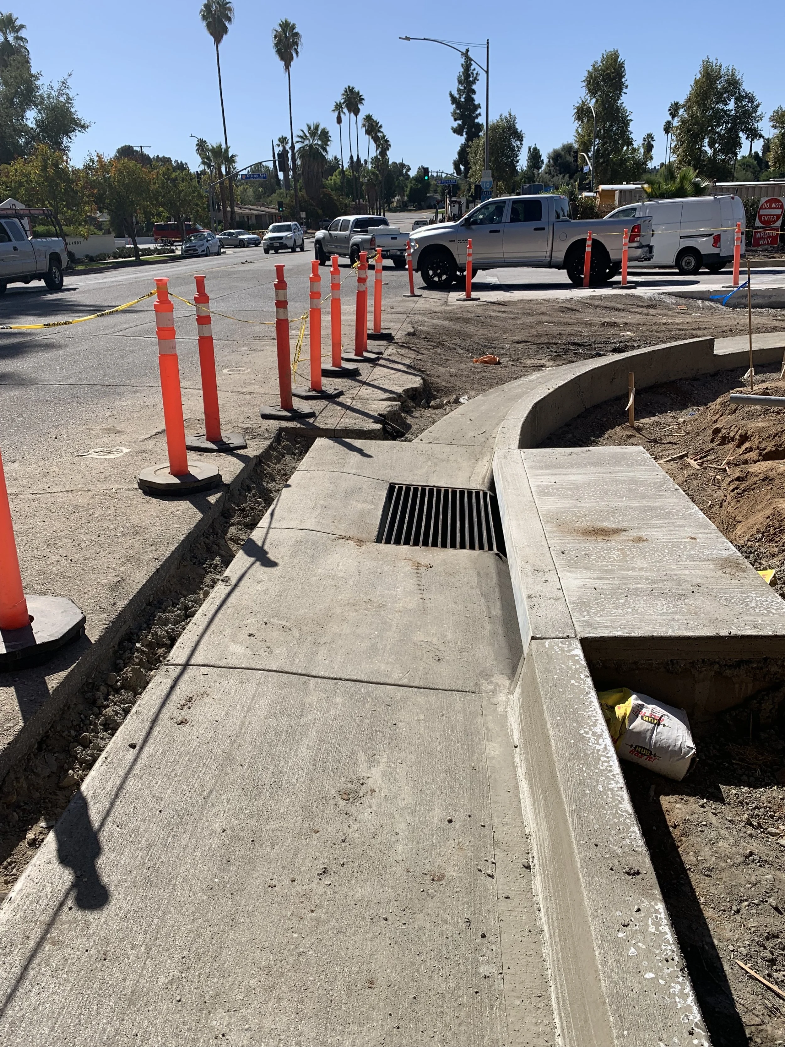 Street repairs gutters , drains, and sidewalk