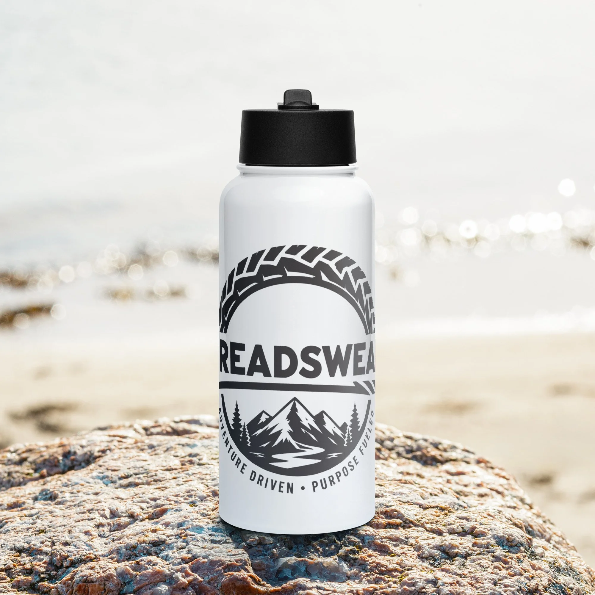 Stainless steel water bottle with a straw lid - Treadswear Logo Badge
